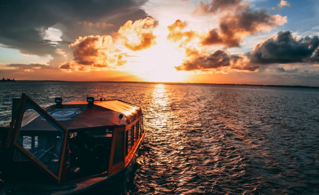 Sunset over the Essequibo River during an evening nature tour in Guyana